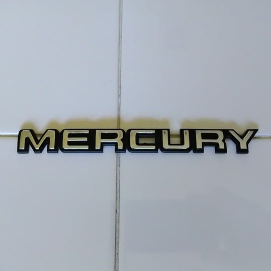 Mercury chrome and black emblem i50ODMCKY