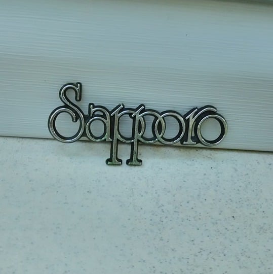 Plymouth Sapporo chrome and black emblem j1qDrV5C4
